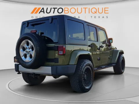 More photos of 2013 Jeep Wrangler Unlimited Sahara at Auto Boutique Ohio, OH