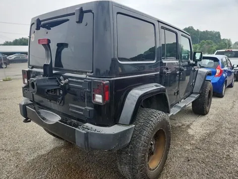 More photos of 2017 Jeep Wrangler Unlimited Sahara at Auto Boutique Ohio, OH