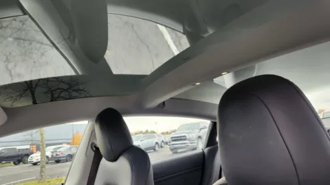 Photos of 2021 Tesla Model 3 Standard Range Plus for sale in Columbus, OH at Auto Boutique Ohio