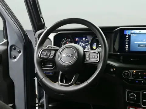 Photos of 2024 Jeep Wrangler 4xe Willys for sale in Terre Haute, IN at Dorsett Nissan