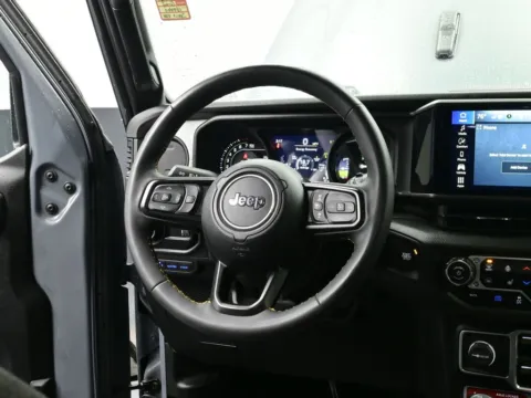 Photos of 2024 Jeep Wrangler 4xe Willys for sale in Terre Haute, IN at Dorsett Nissan