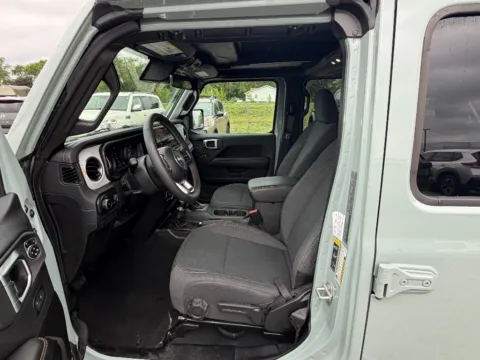 Photos of 2024 Jeep Wrangler Sahara for sale in Terre Haute, IN at Dorsett Nissan