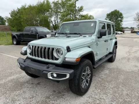 Blue 2024 Jeep Wrangler Sahara for sale in Terre Haute, IN
