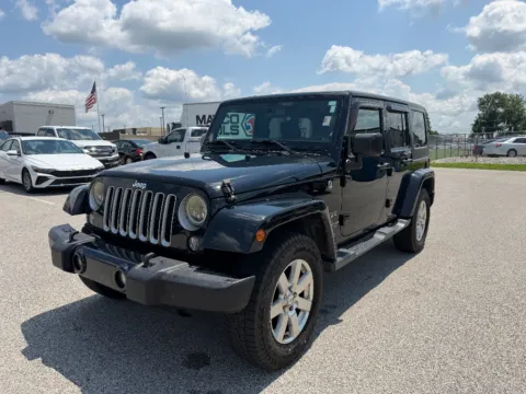 Black 2016 Jeep Wrangler Sahara for sale in Terre Haute, IN