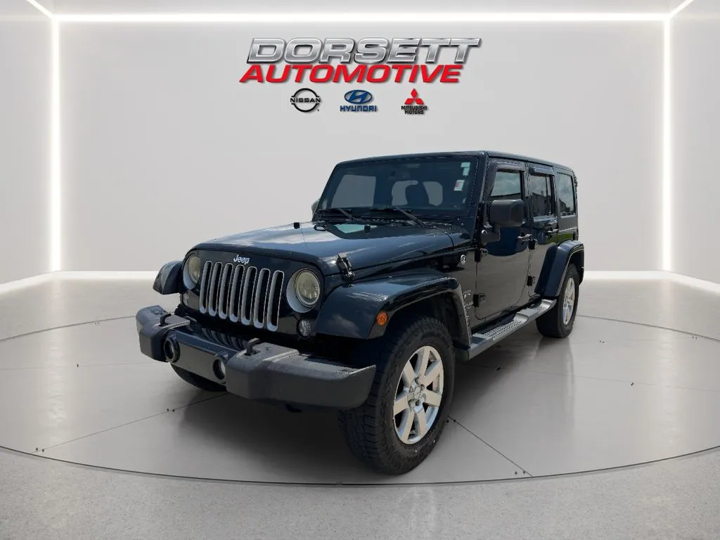 Black 2016 Jeep Wrangler Sahara for sale in Terre Haute, IN