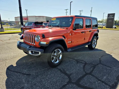 Orange 2018 Jeep Wrangler Sahara for sale in Terre Haute, IN