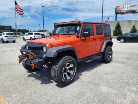 Orange 2015 Jeep Wrangler Sport for sale in Terre Haute, IN