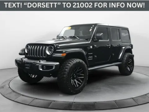 Black 2024 Jeep Wrangler Sahara for sale in Terre Haute, IN