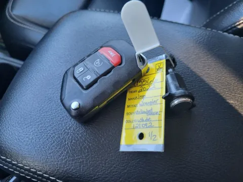 Photos of 2022 Jeep Wrangler 4xe Unlimited Sahara for sale in Terre Haute, IN at Dorsett Nissan