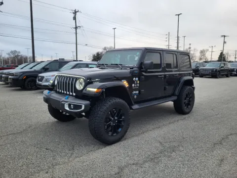 Black 2023 Jeep Wrangler 4xe Sahara for sale in Terre Haute, IN