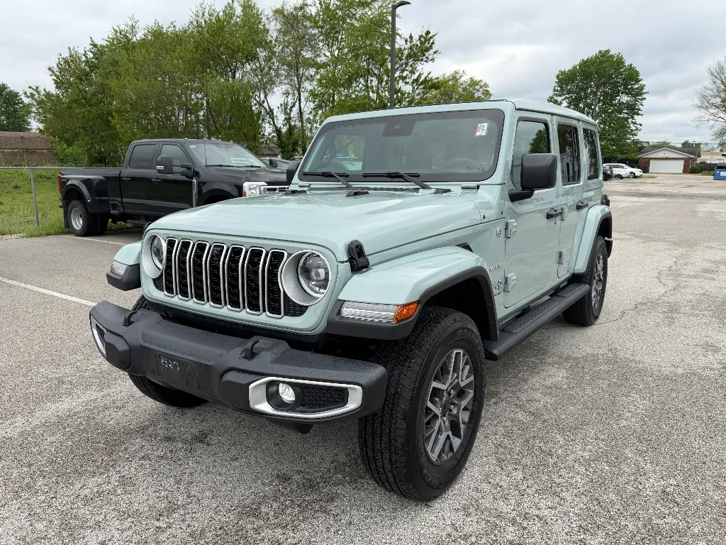 Blue 2024 Jeep Wrangler Sahara for sale in Terre Haute, IN