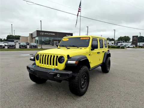 Yellow 2022 Jeep Wrangler Unlimited High Tide for sale in Terre Haute, IN