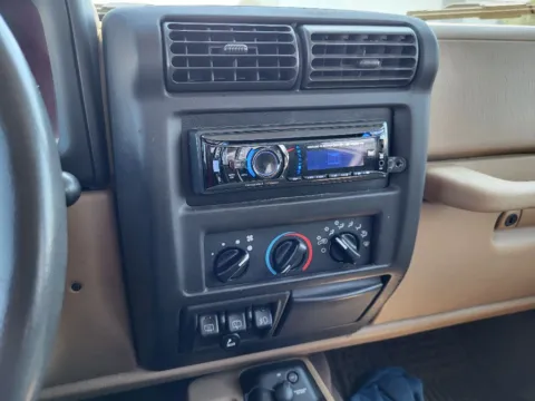 More photos of 1999 Jeep Wrangler Sahara at Dorsett Mitsubishi, IN