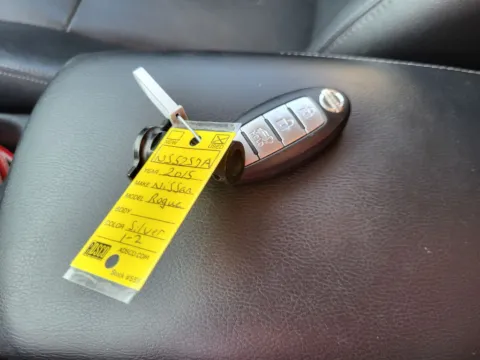 Silver 2015 Nissan Rogue SL for sale in Terre Haute, IN