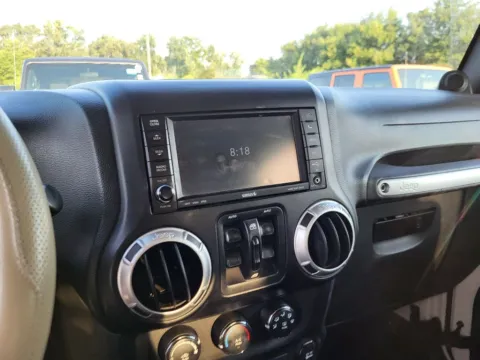 More photos of 2011 Jeep Wrangler Unlimited Sahara at Dorsett Mitsubishi, IN