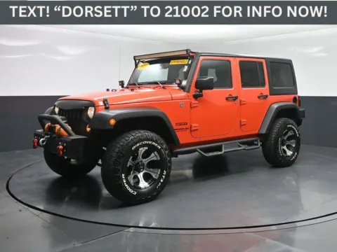 Orange 2015 Jeep Wrangler Sport for sale in Terre Haute, IN