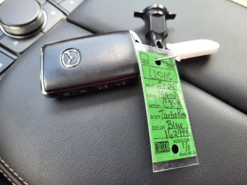 Photos of 2024 Mazda CX-90 3.3 Turbo Premium for sale in Terre Haute, IN at Dorsett Mitsubishi