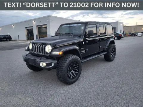 Black 2024 Jeep Wrangler Sahara for sale in Terre Haute, IN