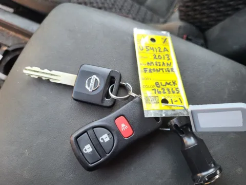 Photos of 2013 Nissan Frontier SV for sale in Terre Haute, IN at Dorsett Mitsubishi