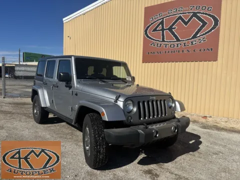 Silver 2015 Jeep Wrangler Unlimited Freedom Edition for sale in Abilene, TX