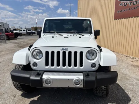 Photos of 2015 Jeep Wrangler Unlimited Sahara for sale in Abilene, TX at 4M Autoplex - Industrial Blvd