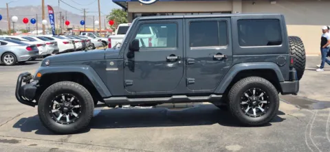Another view of 2016 Jeep Wrangler Unlimited Freedom Sport Utility 4D for sale in El Paso, TX at Best Deal Auto Group