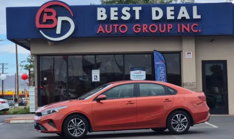 Orange 2023 Kia Forte LXS Sedan 4D for sale in El Paso, TX