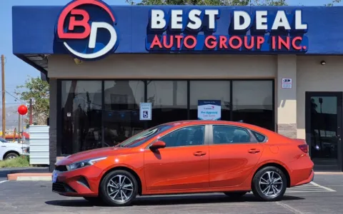 Orange 2023 Kia Forte LXS Sedan 4D for sale in El Paso, TX