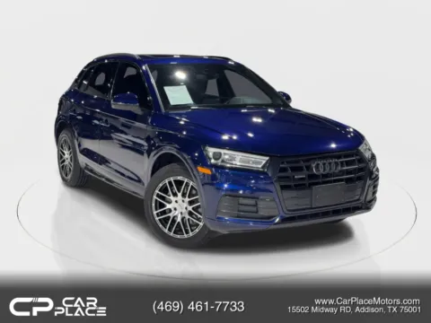 Blue 2020 Audi Q5 45 TFSI Titanium Premium Sport Utility 4D for sale in Addison, TX