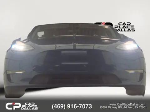 Photos of 2021 Tesla Model Y Standard Range Sport Utility 4D for sale in Addison, TX at Car Place Dallas