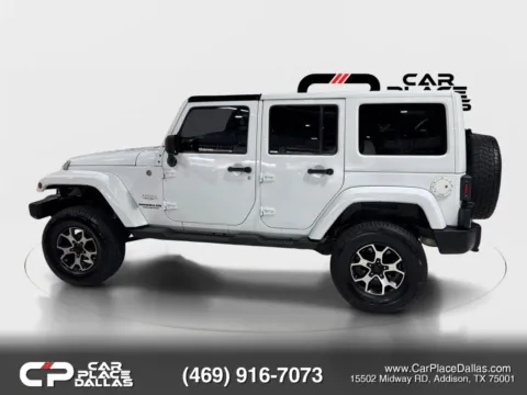 Another view of 2014 Jeep Wrangler Unlimited Sahara for sale in Addison, TX at Car Place Dallas