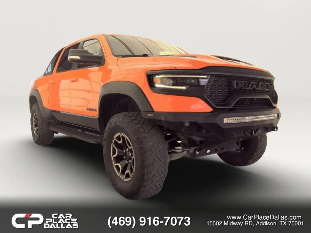 Orange 2022 Ram 1500 Crew Cab TRX Pickup 4D 5 1/2 ft for sale in Addison, TX