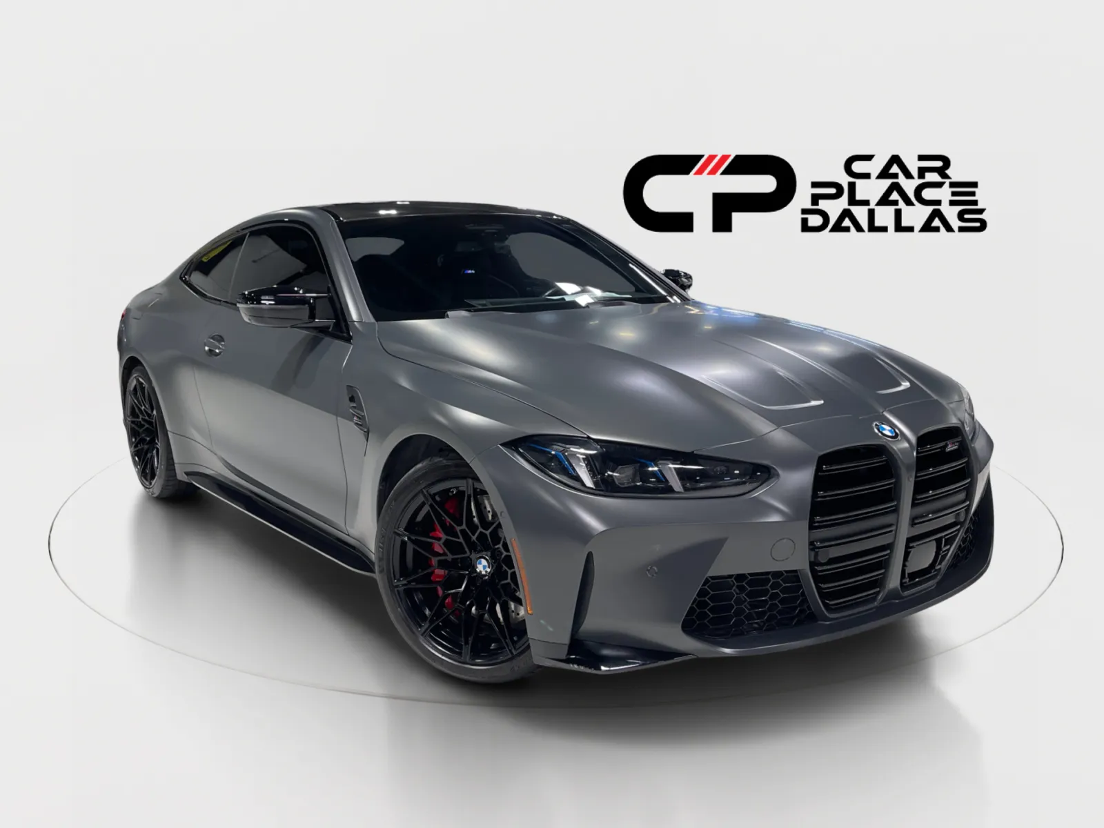 Gray 2025 BMW M4 Competition xDrive,DRAVIT GREY,EXEC PKG,DRIVING ASST PRO,CARBON TRIM,HUD,HK,360 CAM,RED M BRAKES for sale in Addison, TX