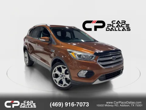 Orange 2017 Ford Escape Titanium Sport Utility 4D for sale in Addison, TX