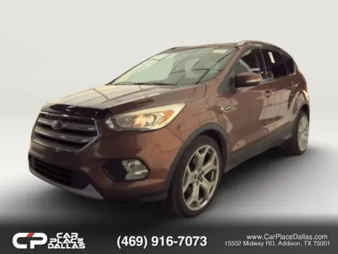 Orange 2017 Ford Escape Titanium Sport Utility 4D for sale in Addison, TX