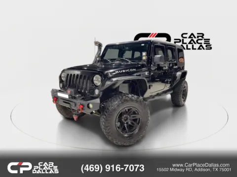 Photos of 2014 Jeep Wrangler Unlimited Rubicon Sport Utility 4D for sale in Addison, TX at Car Place Dallas