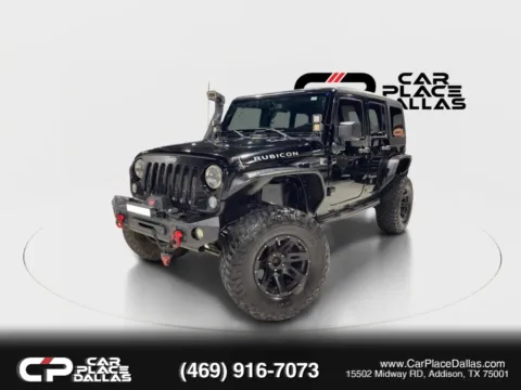 Photos of 2014 Jeep Wrangler Unlimited Rubicon Sport Utility 4D for sale in Addison, TX at Car Place Dallas