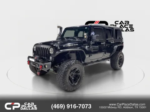 Another view of 2014 Jeep Wrangler Unlimited Rubicon Sport Utility 4D for sale in Addison, TX at Car Place Dallas