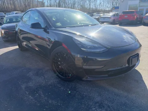 Photos of 2021 Tesla Model 3 Standard Range Plus for sale in Blue Springs, MO at MAG Auto - Munsterman Automotive Group