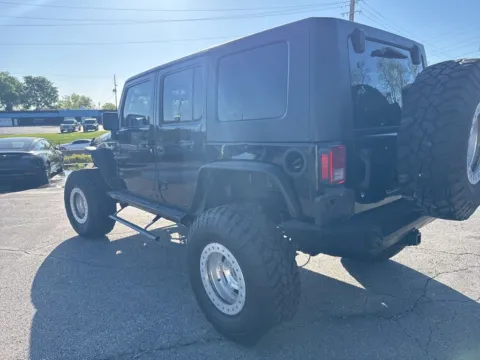 Another view of 2014 Jeep Wrangler Unlimited Rubicon for sale in Blue Springs, MO at MAG Auto - Munsterman Automotive Group