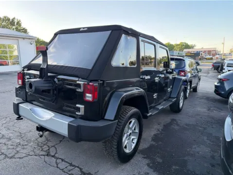 Photos of 2015 Jeep Wrangler Unlimited Sahara for sale in Blue Springs, MO at MAG Auto - Munsterman Automotive Group
