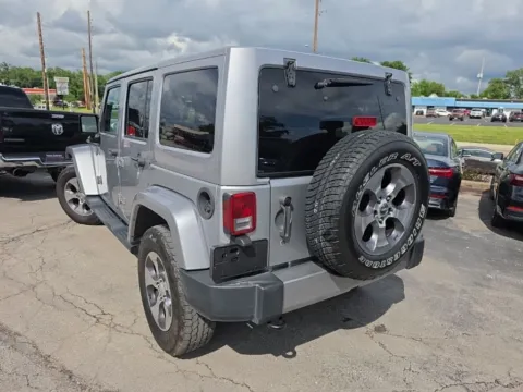 Another view of 2016 Jeep Wrangler Unlimited Sahara for sale in Blue Springs, MO at MAG Auto - Munsterman Automotive Group