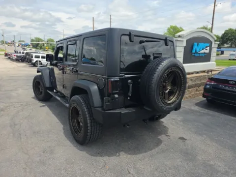 Another view of 2016 Jeep Wrangler Unlimited Sport for sale in Blue Springs, MO at MAG Auto - Munsterman Automotive Group