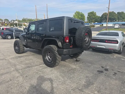 Another view of 2013 Jeep Wrangler Unlimited Sahara for sale in Blue Springs, MO at MAG Auto - Munsterman Automotive Group