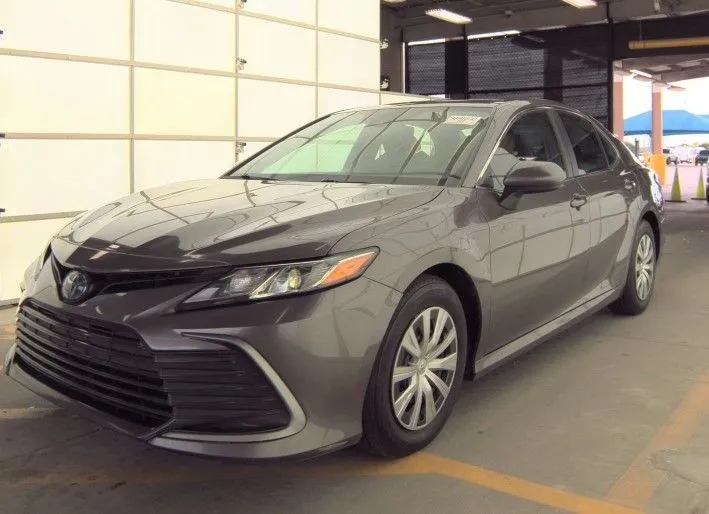 Gray 2022 Toyota Camry Hybrid LE for sale in Denton, TX