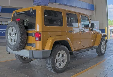 More photos of 2014 Jeep Wrangler Unlimited Sahara at Sign It Drive It, TX