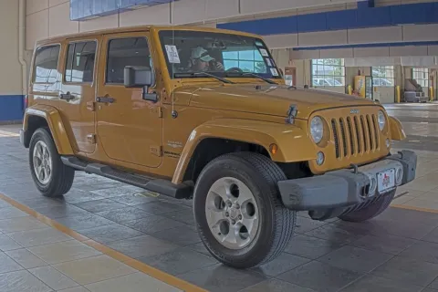 Another view of 2014 Jeep Wrangler Unlimited Sahara for sale in Denton, TX at Sign It Drive It