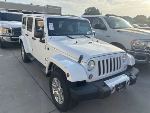 Another view of 2014 Jeep Wrangler Unlimited Sahara for sale in Denton, TX at Sign It Drive It