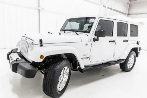 Another view of 2014 Jeep Wrangler Unlimited Sahara for sale in Denton, TX at Sign It Drive It