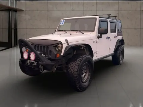 Black 2012 Jeep Wrangler Unlimited Rubicon Sport Utility 4D for sale in Dallas, OR